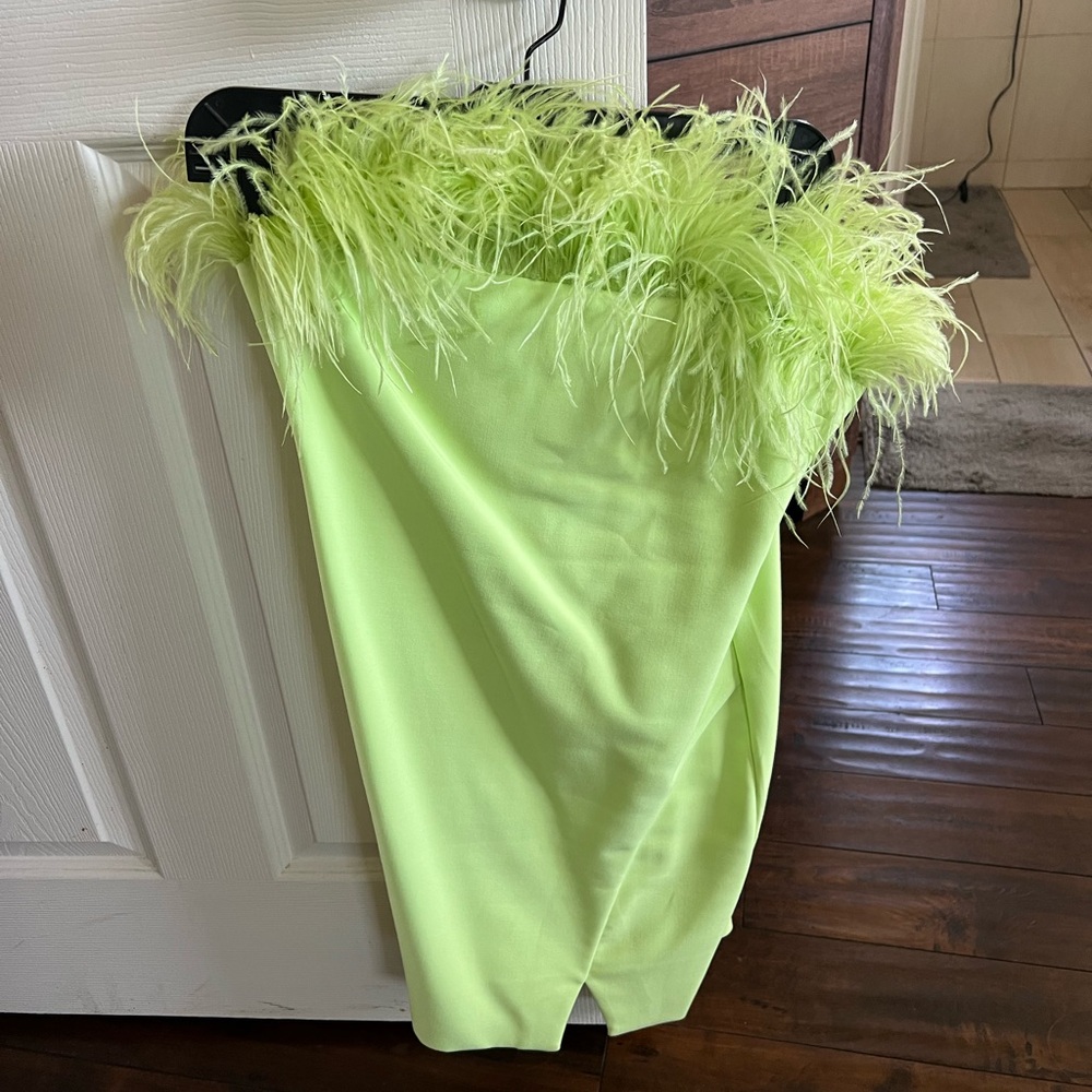 Gorgeous dress light green with feathers